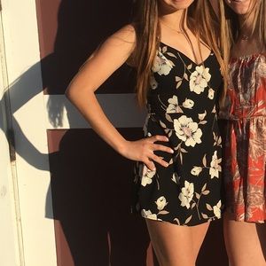 Black floral romper only used once